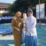 Selamat! Siswi Desain Komunikasi Visual SMKN 2 Lumajang Sabet Juara 1 FLS3N Kabupaten Lumajang Bidang Desain Poster.